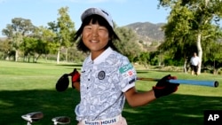Miroku Suto of Japan poses for a portrait after the final round at the Junior World Championships golf tournament held at Singing Hills Golf Resort on Thursday, July 14, 2022, in El Cajon, Calif. (AP Photo/Denis Poroy)