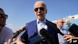 FILE - President Joe Biden speaks to members of the media after exiting Air Force One, Wednesday, July 20, 2022, at Andrews Air Force Base, Md. 