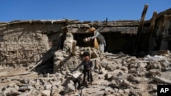 FILE - A 5.1 magnitude earthquake struck the same region of eastern Afghanistan – pictured here – on Monday as one did in late June. The June quake killed hundreds of people and destroyed dozens of structures, such as those in this photo taken June 24, 2022.

