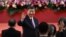 FILE - China's President Xi Jinping waves following his speech after a ceremony to inaugurate the city's new leader and government in Hong Kong on July 1, 2022.