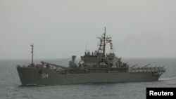 Drones stand at an Iranian military ship in the Indian ocean, Iran, in this handout image obtained by Reuters on July 15, 2022. 