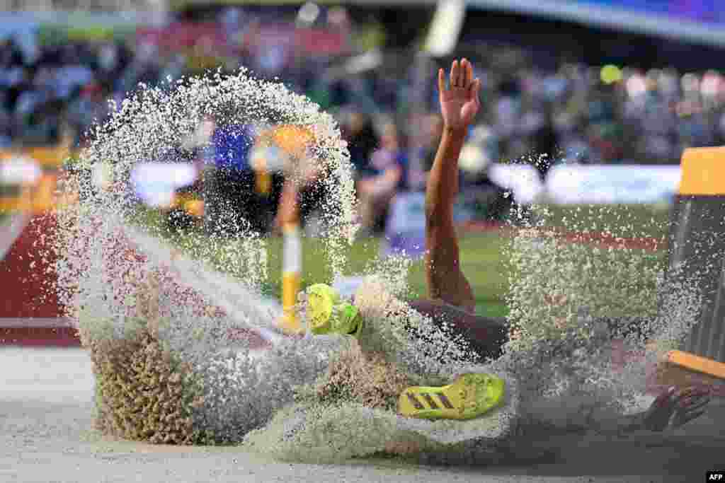 USA's Quanesha Burks competes in the women's long jump final during the World Athletics Championships at Hayward Field in Eugene, Oregon, July 24, 2022. 