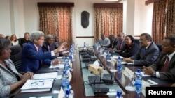 U.S. Secretary of State John Kerry (2nd L) participates in a meeting with Ethiopian Minister of Foreign Affairs Tedros Adhanom (2nd R), Kenyan Foreign Minister Amina Mohamed (3rd R) and Ugandan Foreign Affairs Minister Sam Kutesa (R) in Addis Ababa, May 1