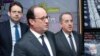 Hollande adoube Macron à Bruxelles pour faire barrage à Marine Le Pen