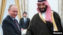 Russian President Vladimir Putin shakes hands with Saudi Deputy Crown Prince and Defence Minister Mohammed bin Salman during a meeting at the Kremlin in Moscow, Russia, May 30, 2017. 