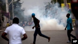 Manifestasyon nan Pòtoprens kont Prezidan Michel Martelly 24, janvye 2016. Pòtoprens,Ayiti.