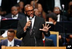 Tyler Perry speaks during the funeral service for Aretha Franklin at Greater Grace Temple, Aug. 31, 2018, in Detroit.