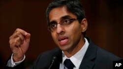 FILE - Dr. Vivek Hallegere Murthy, President Barack Obama's nominee to be the next U.S. Surgeon General, testifies on Capitol Hill in Washington, Feb. 4, 2014. 
