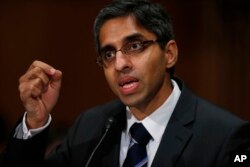 FILE - Dr. Vivek Murthy testifies on Capitol Hill in Washington, Feb. 4, 2014.