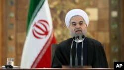 Iranian President Hassan Rouhani speaks at a news conference in Tehran, Iran, Jan. 17, 2016. 