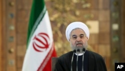 Le président iranien Hassan Rohani lors d'un discours à Téhéran, le 17 janvier 2016. (AP Photo/Ebrahim Noroozi) 