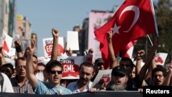 Demonstrators shout slogans during an anti-government protest in Istanbul's Kadikoy district Sept. 15, 2013.