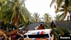 Kawasan wisata Tanjung Lesung, provinsi Banten tampak porak-poranda pasca bencana tsunami (24/12).