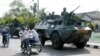 FILE - Indonesian soldiers patrol the streets of Lhokseumawe, June 24, 2003, in the restive province of Aceh, Indonesia. 