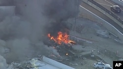 This image made from video shows the site of a plane crash at Essendon Airport in Melbourne, Australia, Feb. 21, 2017.