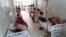 Patients are shown at the district government hospital in Eluru, Andhra Pradesh state, India, Dec.6, 2020.