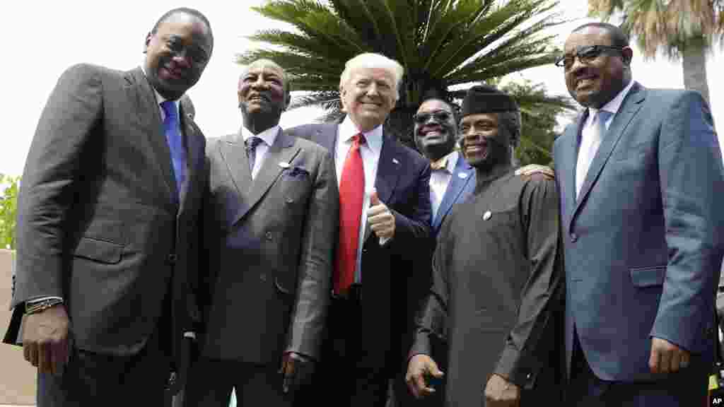 President Trump poses with African leaders, from left, Kenya&#39;s President Uhuru Kenyatta, President of the African Union Alpha Conde&#39;, President of the African Development Bank Akinwumi Adesina, Nigeria&#39;s Vice President Yemi Osinbajo and Ethiopia&#39;s Prime Minister Haile Mariam Desalegn.