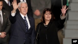 U.S. Vice President Mike Pence and his wife Karen wave as they landed at Tel Aviv airport Sunday, Jan. 21, 2018. Pence will pay a three day visit to Israel.