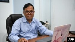 Cambodian psychiatrist Sotheara Chhim, 54, poses at his office in Phnom Penh on August 31, 2022. Chhim, a Cambodian psychiatrist, was on August 31, 2022 among the winners of the 2022 Ramon Magsaysay Award -- considered Asia's Nobel Prize.