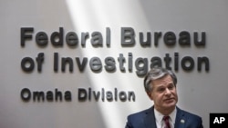 FBI Director Christopher Wray speaks to journalists at the Omaha FBI office on Aug.10, 2022, in Omaha, Neb.