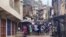 Protesters shout as they face riot police during anti-government protests in Freetown, Sierra Leone, Aug. 10, 2022. 