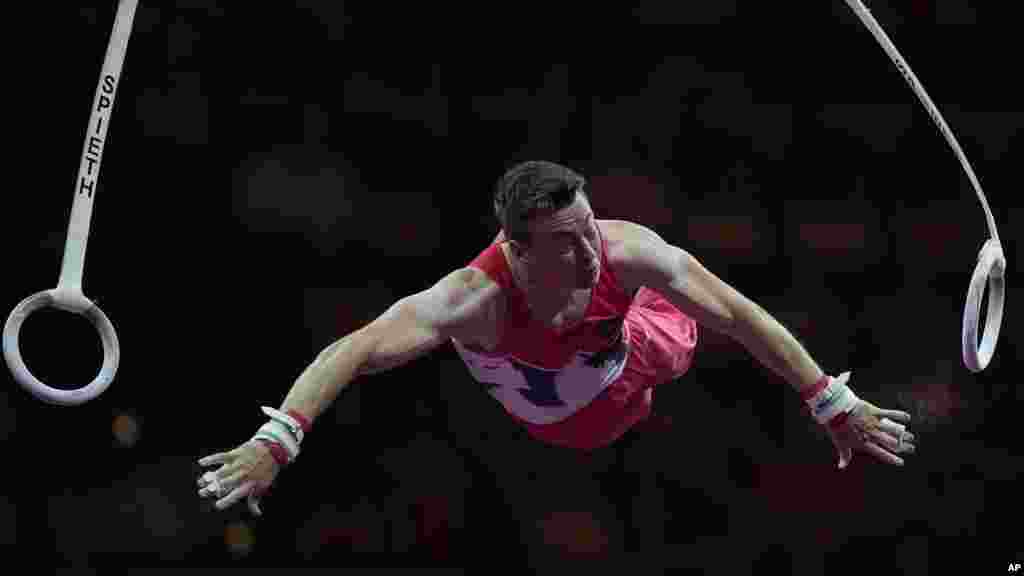 Austria&#39;s Manuel Helmut Arnold performs on the rings during the men&#39;s all-around final at the European Gymnastics Championships in Munich.(AP Photo/Pavel Golovkin)