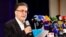 Politisi reformis Iran Mostafa Tajzadeh berbicara kepada media setelah mendaftarkan pencalonannya di Kementerian Dalam Negeri di Teheran, 14 Mei 2021. (Foto: AFP)