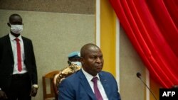 FILE - Central African Republic President Faustin Archange Touadera (R) is seen during the anniversary of the one year of mandate at the national assembly in Bangui on March 30, 2022. 