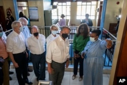 Members of a U.S. congressional delegation visit the Tabitha Medical Clinic run by CFK Africa in the Kibera neighborhood of Nairobi, Kenya, Aug. 18, 2022.