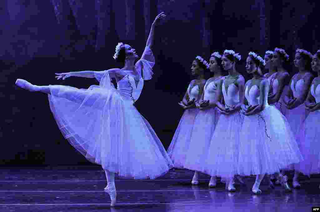 Dancers from the National Ballet of Panama perform a scene from Giselle at the National Theater of Panama in Panama City, Aug. 20, 2022.