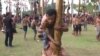 Indonesians Celebrate Independence Day with ‘Greasy’ Tree Trunk Climbing 