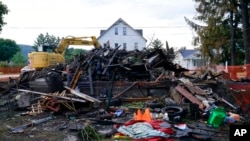 A house that was destroyed by a fatal fire is seen in Nescopeck, Pa., Aug. 5, 2022. 