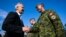 NATO Secretary-General Jens Stoltenberg meets with members of the Canadian armed forces at the Royal Canadian Air Force base in Cold Lake, Alberta, Aug. 26, 2022. (NATO handout)