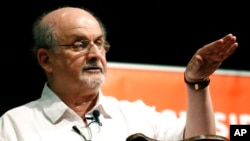 FILE — Author Salman Rushdie talks about the start of his writing career, during the Mississippi Book Festival, in Jackson, Miss., on Aug. 18, 2018.