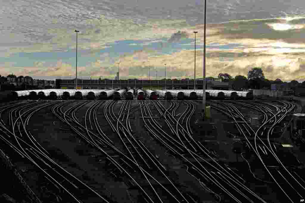 Piccadilly line trains sit in their depot as members of the Rail, Maritime and Transport union (RMT) strike over jobs, pay and pensions in London.