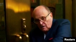 Rudy Giuliani, former US President Donald Trump's personal lawyer, arrives at a courthouse to face a special grand jury regarding a probe into the 2020 election in Atlanta, Georgia, Aug. 17, 2022 in a still image from video.