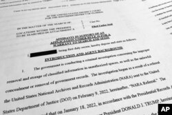 The affidavit by the FBI in support of obtaining a search warrant for former President Donald Trump's Mar-a-Lago estate is photographed, Aug. 26, 2022.