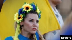 旅居马耳他的乌克兰人举行独立日纪念活动。（路透社2022年8月23日）
