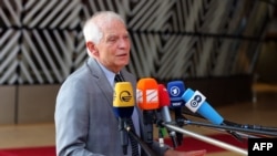 FILE - European Union High Representative for Foreign Affairs and Security Policy Josep Borrell Fontelles speaks to the press before a meeting of EU foreign ministers at the European Council in Brussels, July 18, 2022.