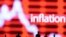资料照 - 路透社的这张合成示意照上可以看到在预示着股市走势的红色背景上，白色的英文“inflation”（通胀）清晰可见。