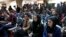 Afghan Journalists attend a press conference of a former president Hamid Karzai in Kabul, Afghanistan, Feb. 13, 2022.