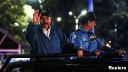FILE - Nicaraguan President Daniel Ortega takes part in a parade military to commemorate the 40th anniversary of National Police founding in Managua, Nicaragua, September 24, 2019. 