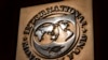 FILE - The logo of the International Monetary Fund on its building, April 5, 2021, in Washington. 