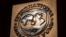 FILE - The logo of the International Monetary Fund is visible on their building, April 5, 2021, in Washington. 