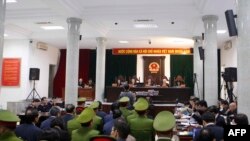 FILE - A general view of the corruption trial of Vietnam's National Oil Company VPN's former executives at Hanoi People's Courthouse on Jan. 8, 2018. A new regulation will punish journalists who record audio or video without consent of the presiding judge.