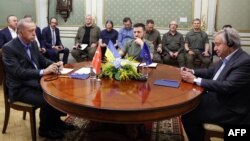 This handout photograph taken and released by Turkish Presidential Press Service Aug. 18, 2022, shows Turkish President Tayyip Erdogan (L), Ukrainian President Volodymyr Zelenskyy (C) and U.N. Secretary-General Antonio Guterres (R) as they meet in Lviv, U