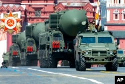 FILE - In this file photo taken on Wednesday, June 24, 2020, Russian RS-24 Yars ballistic missiles roll in Red Square during the Victory Day military parade marking the 75th anniversary of the Nazi defeat in Moscow, Russia.