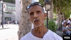 Ennahdha supporter Abdel Fatah Bouani thinks dialogue is key to address Tunisia's crisis. (Lisa Bryant/VOA)