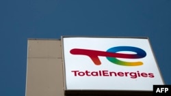 FILE - The logo of French oil and gas company TotalEnergies is seen on an oil and gas station in Berlin, Apr. 29, 2022. 