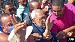 FILE - Rached Ghannouchi arrives at the office of Tunisia's counter-terrorism prosecutor in Tunis on July 19, 2022.